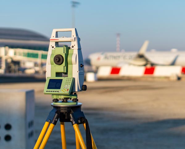 Airport infrastructure upgrade planning with tarmac survey equipment.