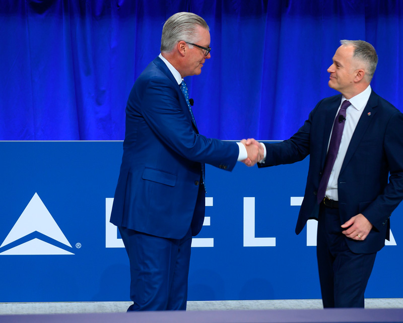 Jeremy Bowen, Cirium CEO, presented Delta’s awards to Ed Bastian, CEO of Delta Air Lines