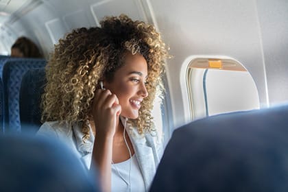 Passenger look out plane window 