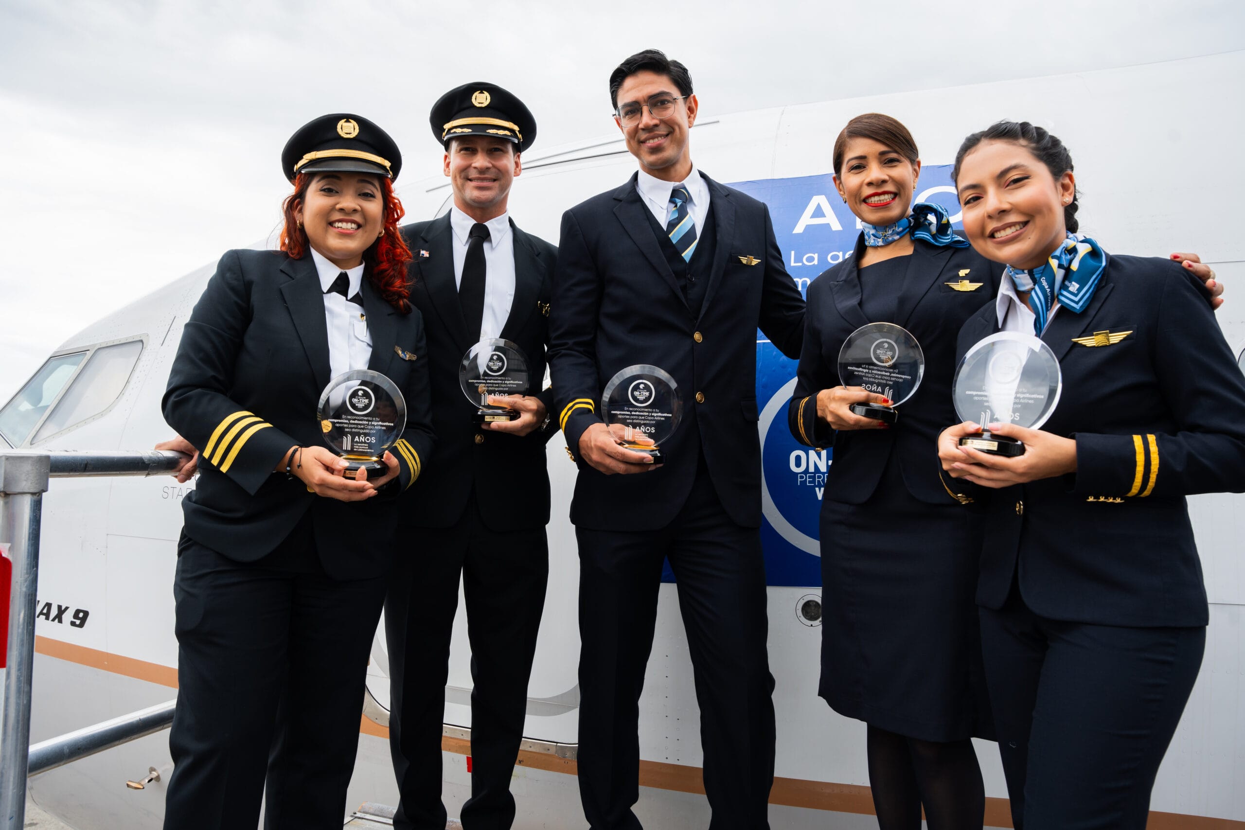 The crew at Copa Airlines celebrates the award for On-Time Performance