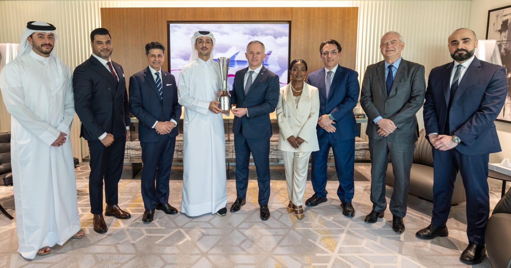 Leadership at Qatar Airlines receiving the 2025 On-Time Performance Award